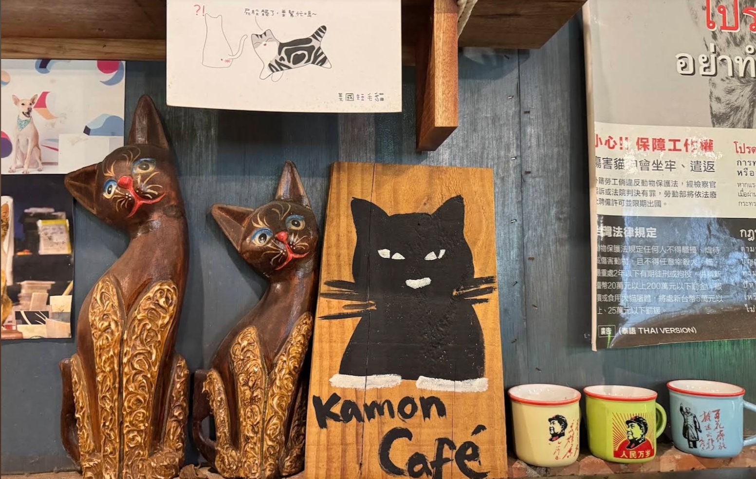 Kamon Café's handmade black cat sign